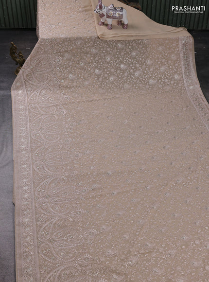 Beige Georgette Saree - Embroidery