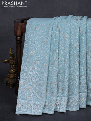 Aque Blue Georgette Saree - Embroidery