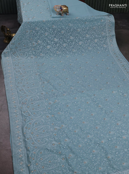 Aque Blue Georgette Saree - Embroidery