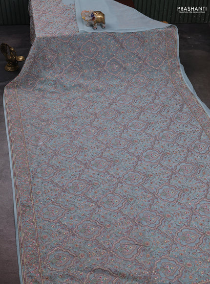 Pastel Blue Georgette Saree - Embroidery