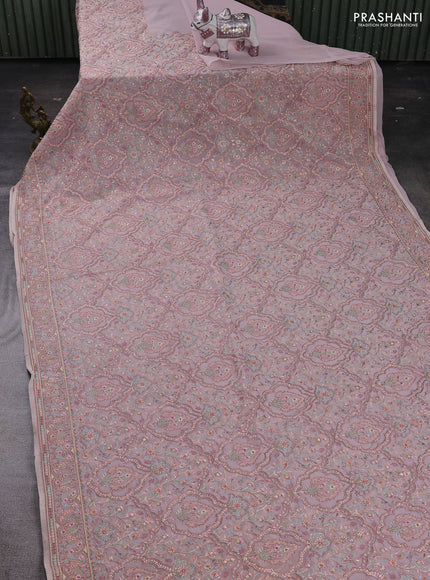 Pastel Pink Georgette Saree - Embroidery
