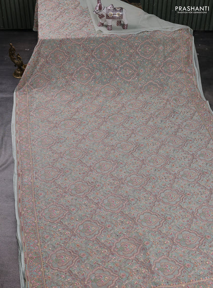 Sag Green Georgette Saree - Embroidery