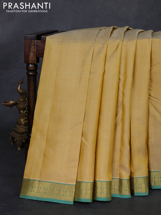 Pale Yellow & Teal Green Pure Kanchipuram Silk Saree - Self Emboss