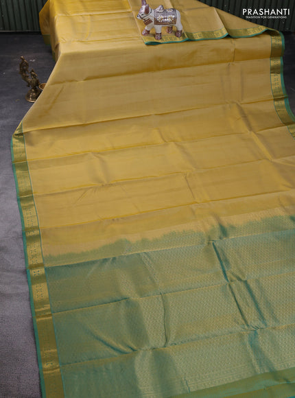 Pale Yellow & Teal Green Pure Kanchipuram Silk Saree - Self Emboss