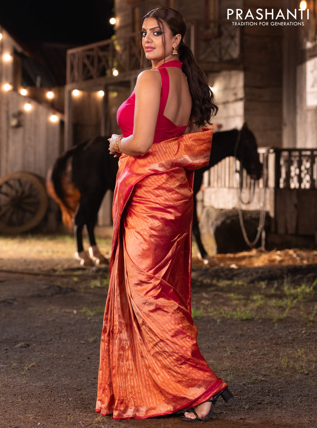 Banarasi katan tissue silk saree dual shade of orange with plain body and long temple design zari woven border