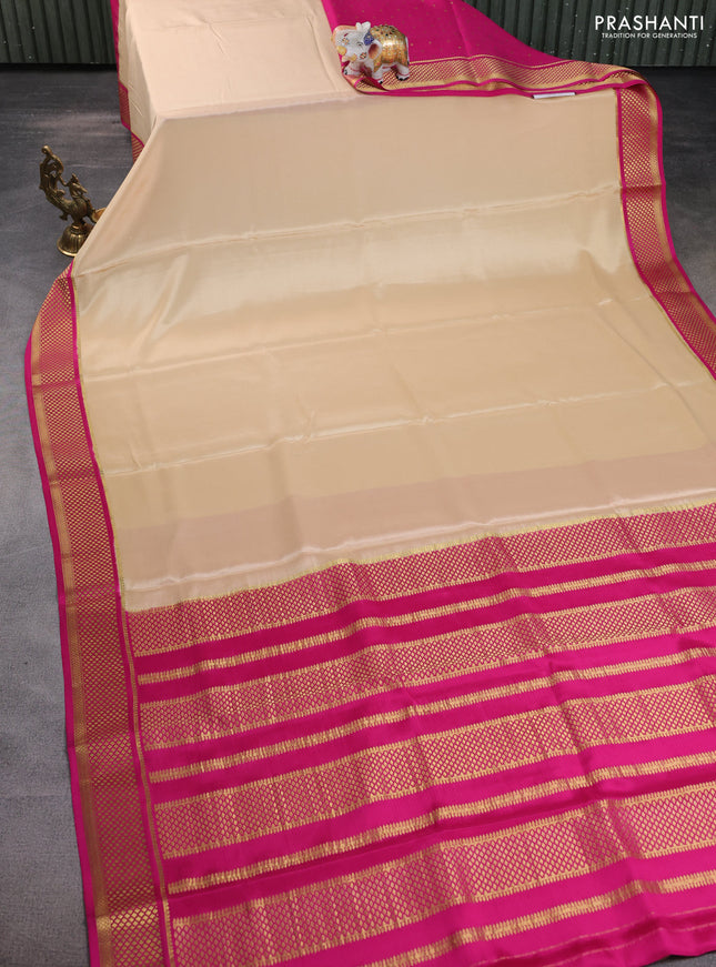 Pure mysore partly silk saree beige and pink with plain body and zari woven border