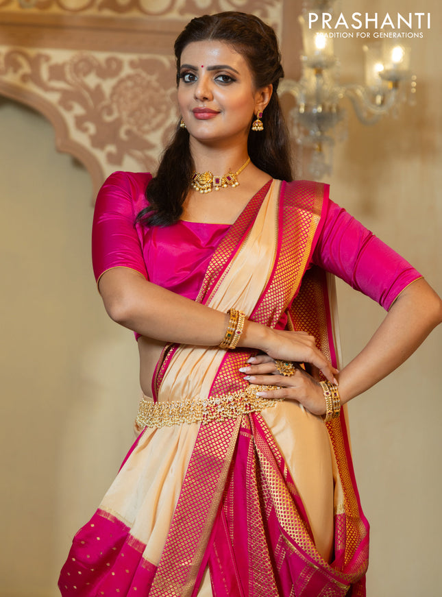Pure mysore partly silk saree beige and pink with plain body and zari woven border