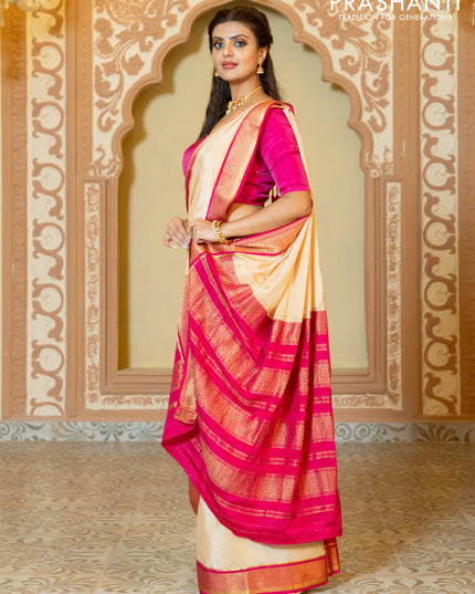 Pure mysore partly silk saree beige and pink with plain body and zari woven border