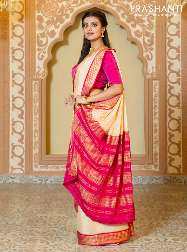Pure mysore partly silk saree beige and pink with plain body and zari woven border