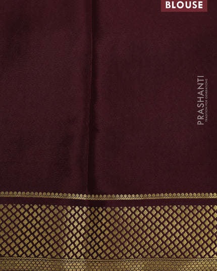 Pure mysore partly silk saree mustard yellow and brown with plain body and zari woven border