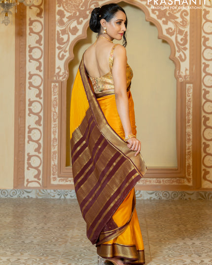 Pure mysore partly silk saree mustard yellow and brown with plain body and zari woven border