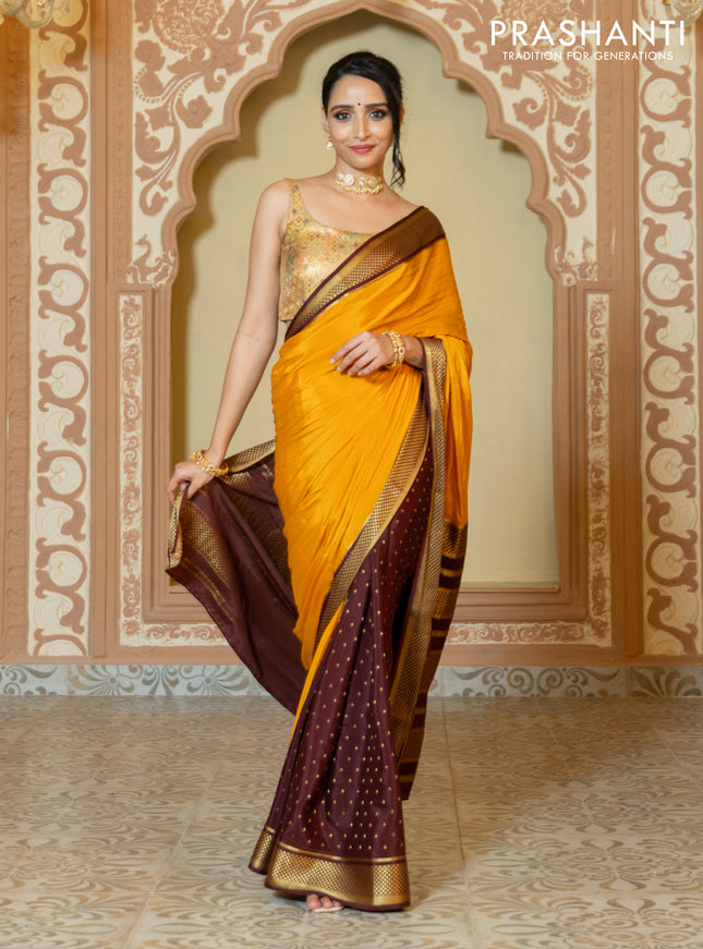 Pure mysore partly silk saree mustard yellow and brown with plain body and zari woven border