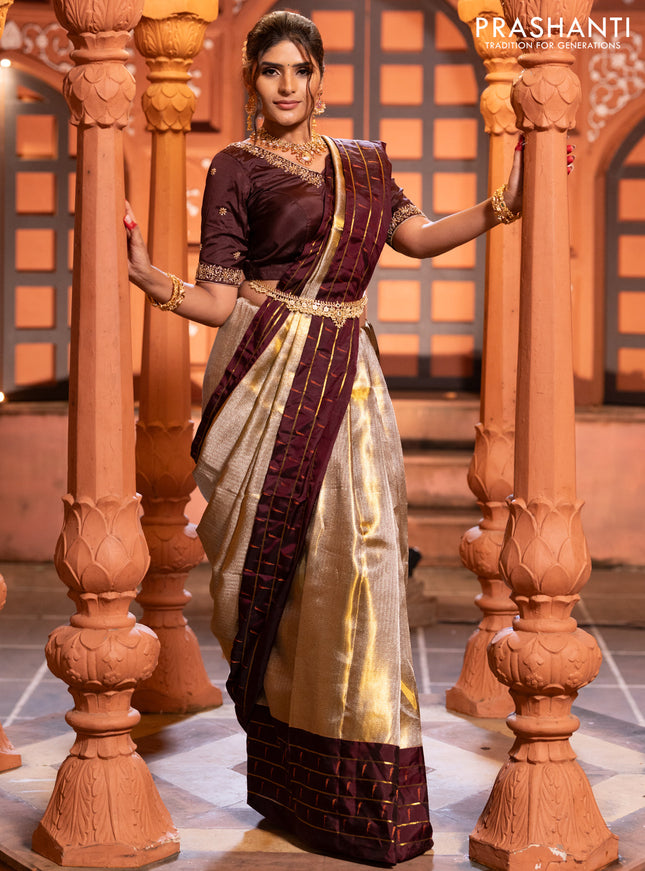 Pure kanchipuram tissue silk saree gold and deep maroon with allover zari woven brocade weaves and muniya butta zari woven border