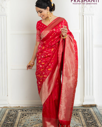 Pure kanchipuram silk saree reddish pink with floral motif zari weaves and silver zari woven border