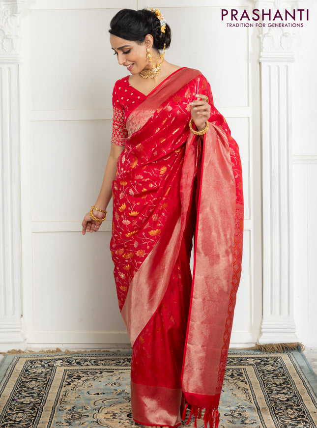 Pure kanchipuram silk saree reddish pink with floral motif zari weaves and silver zari woven border