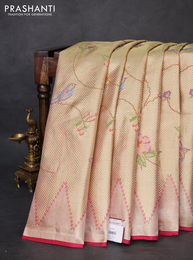 Pure kanchipuram tissue silk saree gold and pink with allover convent embroidery and temple design zari woven border