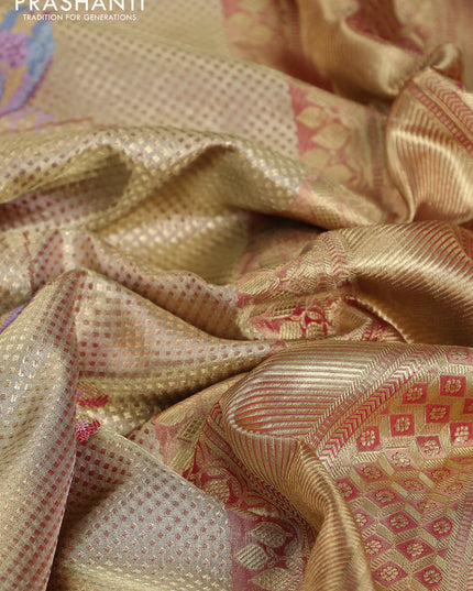 Pure kanchipuram tissue silk saree gold and pink with allover convent embroidery and temple design zari woven border