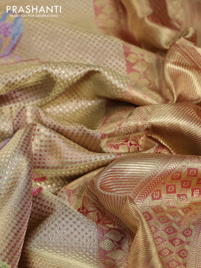 Pure kanchipuram tissue silk saree gold and pink with allover convent embroidery and temple design zari woven border