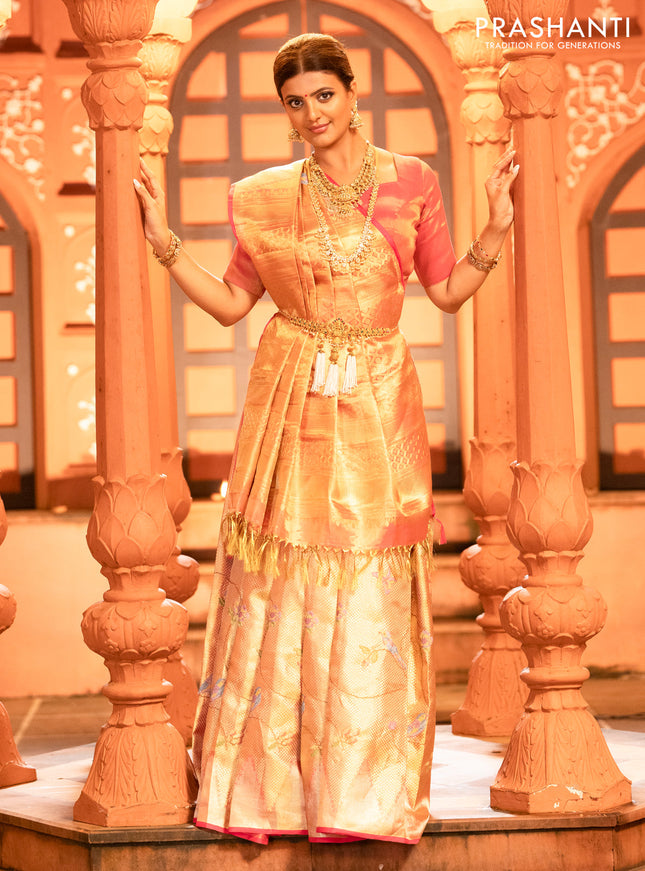 Pure kanchipuram tissue silk saree gold and pink with allover convent embroidery and temple design zari woven border