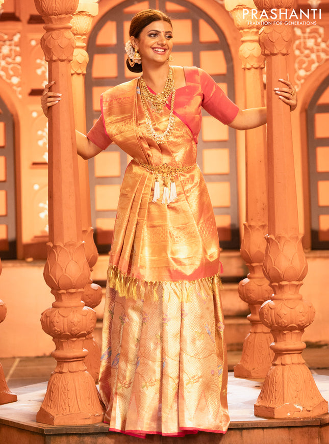 Pure kanchipuram tissue silk saree gold and pink with allover convent embroidery and temple design zari woven border