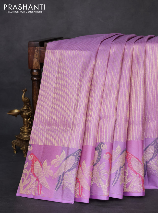 Pure kanchipuram silk saree lavender with allover zari woven brocade weaves and parrot design zari woven border