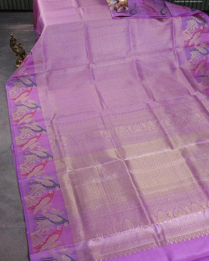 Pure kanchipuram silk saree lavender with allover zari woven brocade weaves and parrot design zari woven border