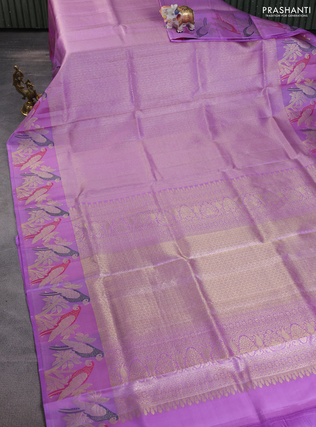 Pure kanchipuram silk saree lavender with allover zari woven brocade weaves and parrot design zari woven border
