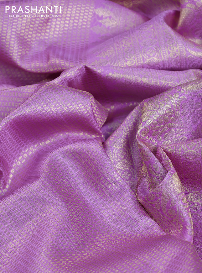 Pure kanchipuram silk saree lavender with allover zari woven brocade weaves and parrot design zari woven border