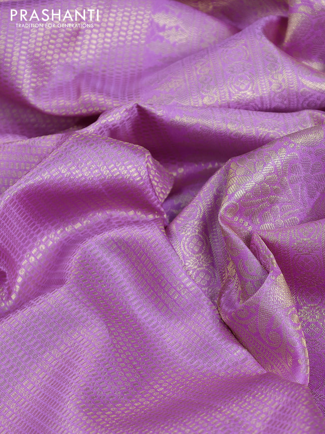 Pure kanchipuram silk saree lavender with allover zari woven brocade weaves and parrot design zari woven border