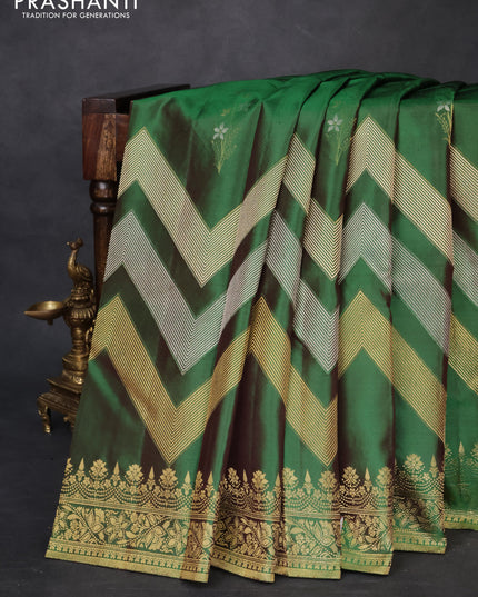 Pure kanchipuram silk saree dual shade of green with floral motifs and long rich zari wover korvai border