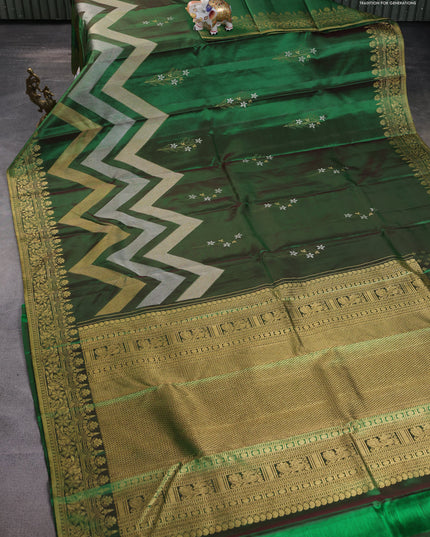 Pure kanchipuram silk saree dual shade of green with floral motifs and long rich zari wover korvai border