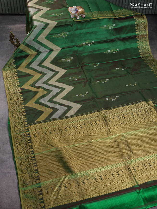 Pure kanchipuram silk saree dual shade of green with floral motifs and long rich zari wover korvai border