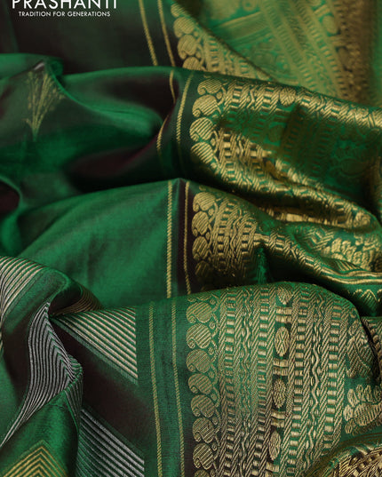 Pure kanchipuram silk saree dual shade of green with floral motifs and long rich zari wover korvai border