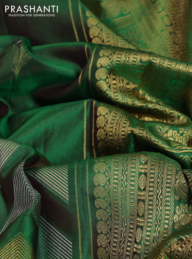 Pure kanchipuram silk saree dual shade of green with floral motifs and long rich zari wover korvai border