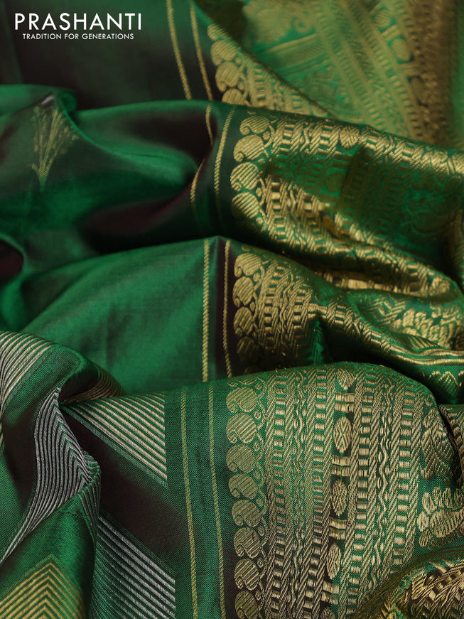 Pure kanchipuram silk saree dual shade of green with floral motifs and long rich zari wover korvai border