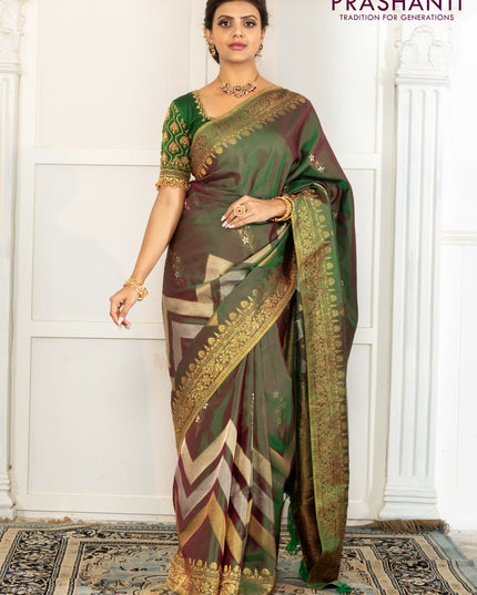 Pure kanchipuram silk saree dual shade of green with floral motifs and long rich zari wover korvai border