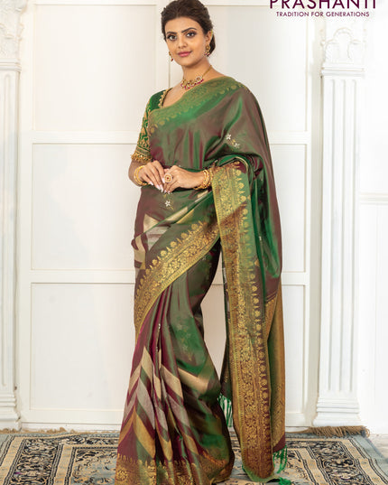 Pure kanchipuram silk saree dual shade of green with floral motifs and long rich zari wover korvai border