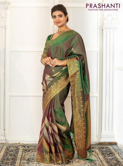 Pure kanchipuram silk saree dual shade of green with floral motifs and long rich zari wover korvai border