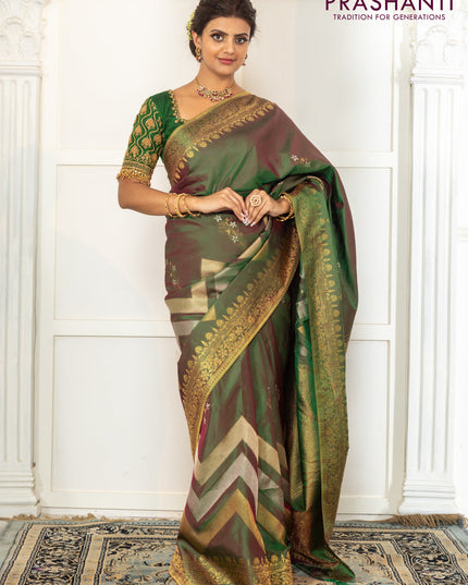 Pure kanchipuram silk saree dual shade of green with floral motifs and long rich zari wover korvai border