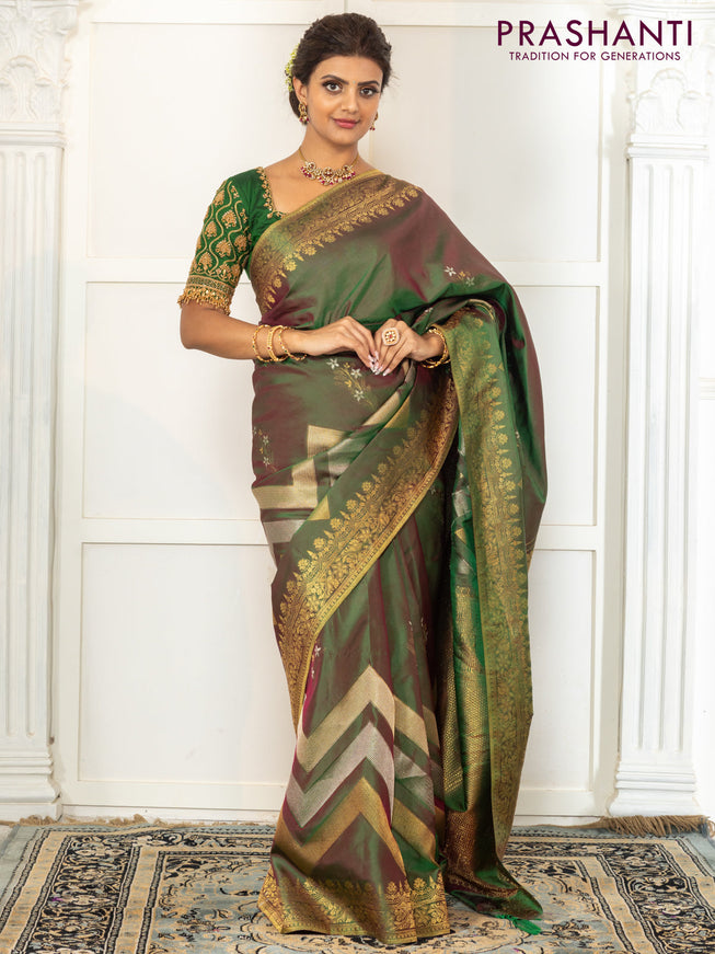 Pure kanchipuram silk saree dual shade of green with floral motifs and long rich zari wover korvai border