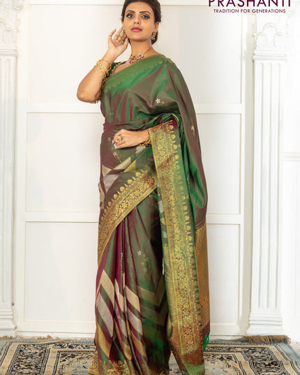 Pure kanchipuram silk saree dual shade of green with floral motifs and long rich zari wover korvai border