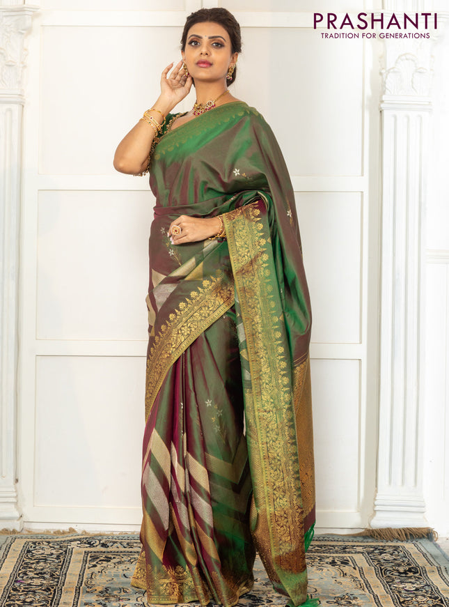 Pure kanchipuram silk saree dual shade of green with floral motifs and long rich zari wover korvai border