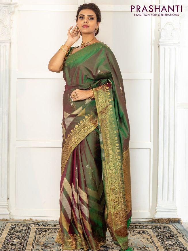 Pure kanchipuram silk saree dual shade of green with floral motifs and long rich zari wover korvai border
