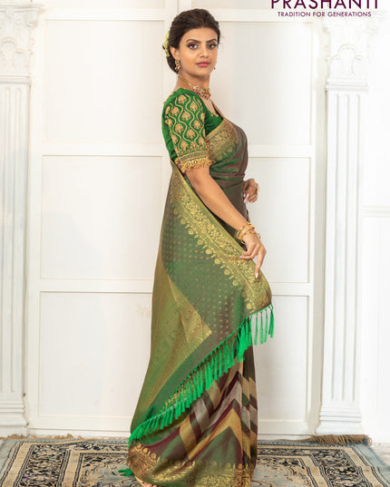 Pure kanchipuram silk saree dual shade of green with floral motifs and long rich zari wover korvai border