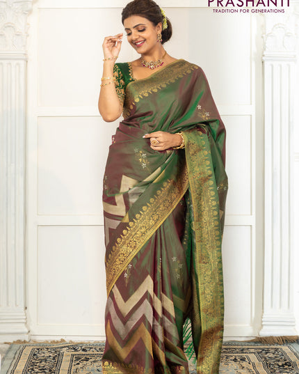 Pure kanchipuram silk saree dual shade of green with floral motifs and long rich zari wover korvai border