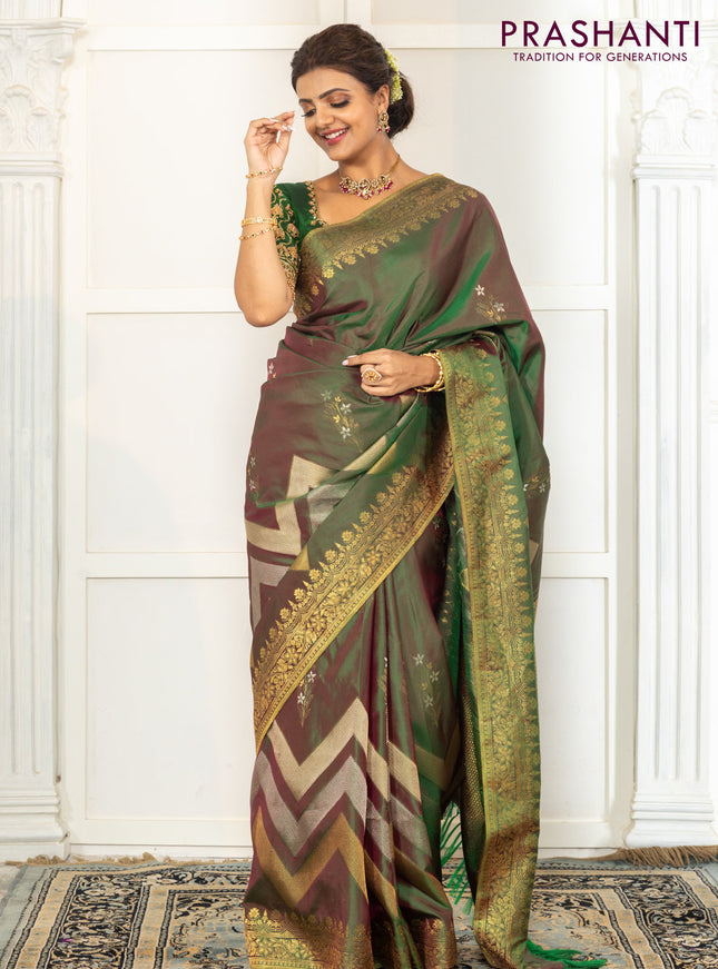 Pure kanchipuram silk saree dual shade of green with floral motifs and long rich zari wover korvai border