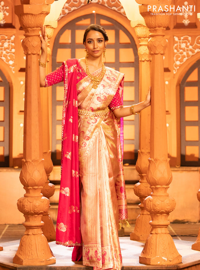 Pure kanchipuram tissue silk saree gold and pink with allover zari woven brocade weaves and zari woven paithani style border