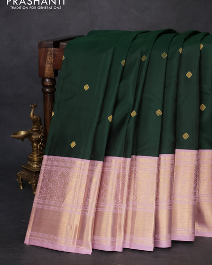 Pure kanchipuram silk saree bottle green and pastel pink with zari woven buttas and long rich zari wover korvai border