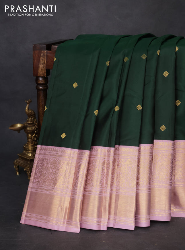 Pure kanchipuram silk saree bottle green and pastel pink with zari woven buttas and long rich zari wover korvai border