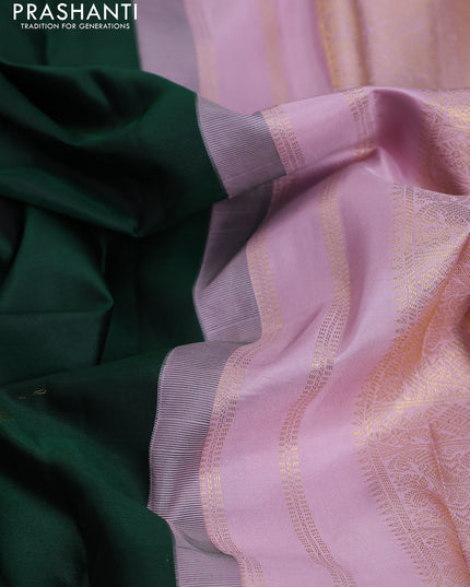 Pure kanchipuram silk saree bottle green and pastel pink with zari woven buttas and long rich zari wover korvai border